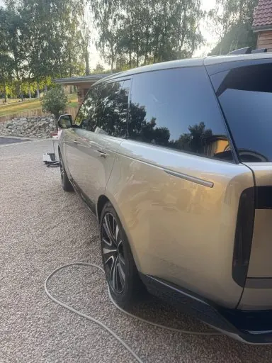 Champagne coloured Range Rover being washed during an exterior detail